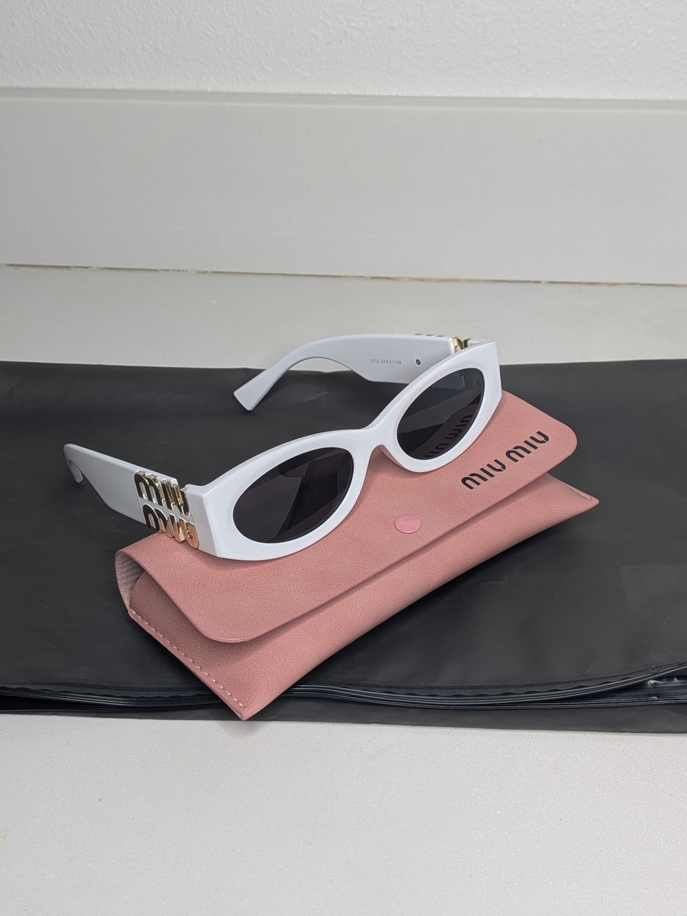 Miu Miu White Oval Sunglasses